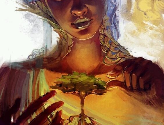 一本の木を手に取る女性