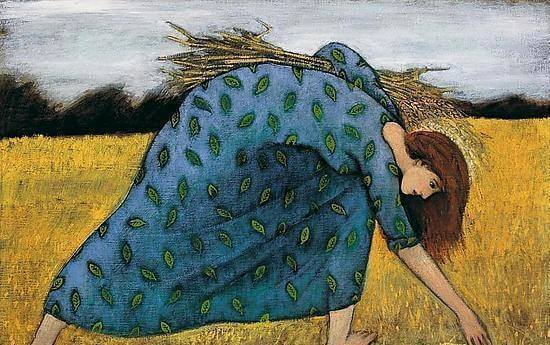 麦を収穫する女性