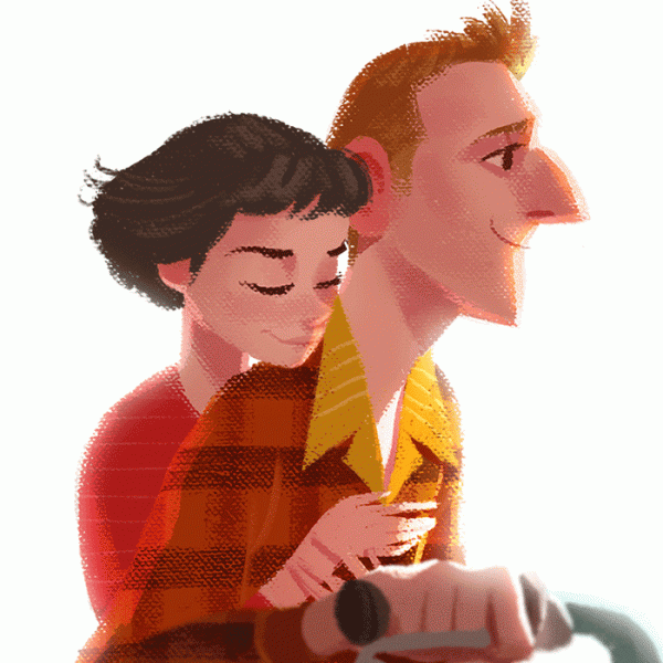 自転車に乗るカップル