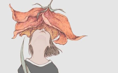 大きな花を見上げる少女