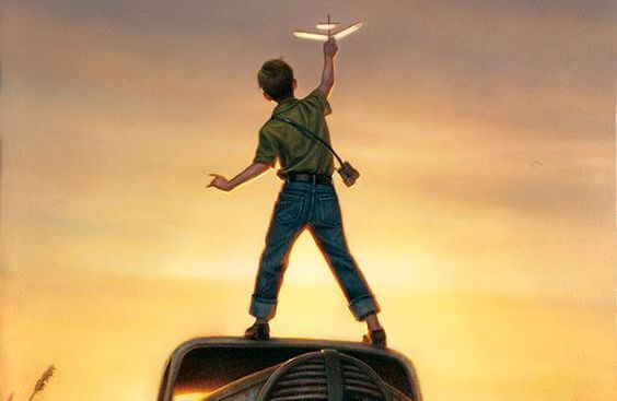 紙飛行機で遊ぶ子供