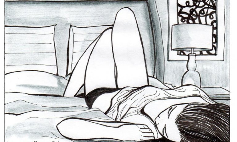 ベットに横たわる女性