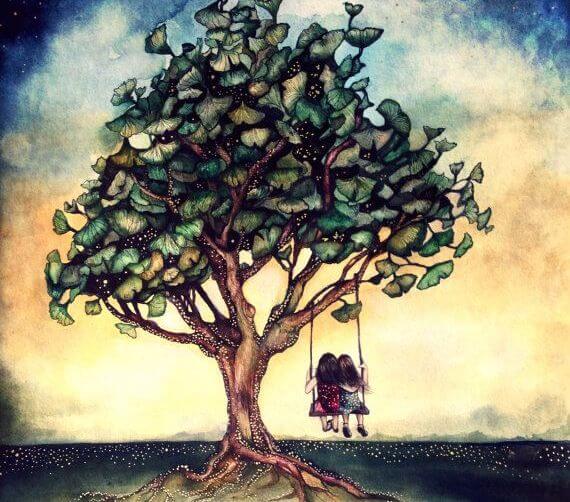 木のブランコに乗る二人の少女