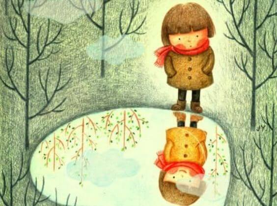 水たまりに映る笑った少女