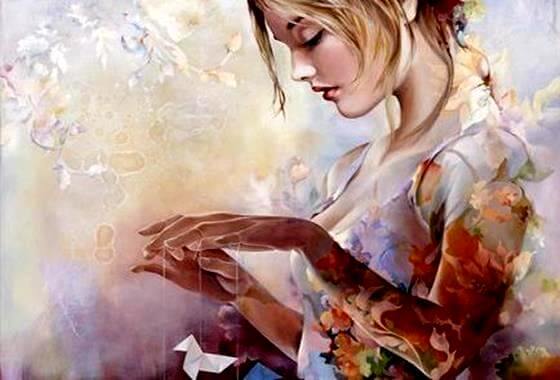 糸を指につけた女性