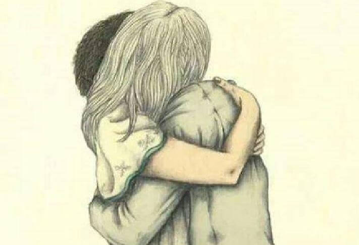 ハグするカップル