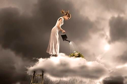 雲の上で水やりをする女性