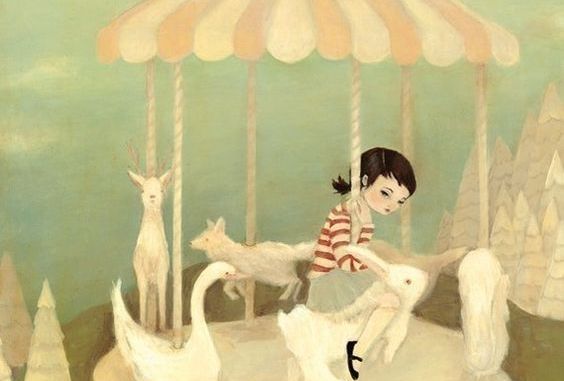 メリーゴーランドにのる少女