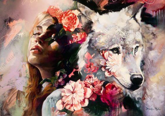 目を閉じる女性とオオカミ