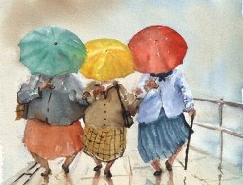 傘をさす3人の老人
