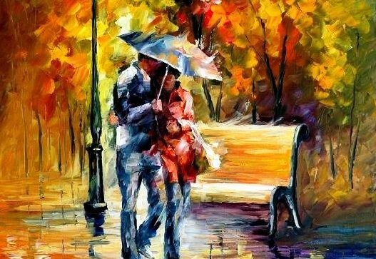 傘をさして歩くカップル