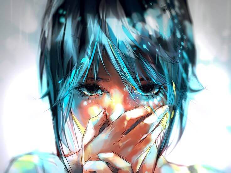 涙を流す青い髪の女性