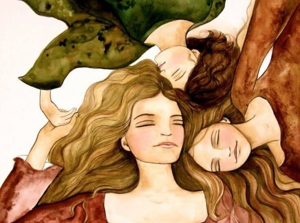 頭を寄せ合う3人の女性