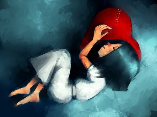 ハートの枕で眠る少女