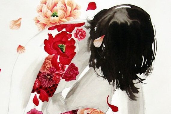 花柄の服を着た女性のお辞儀