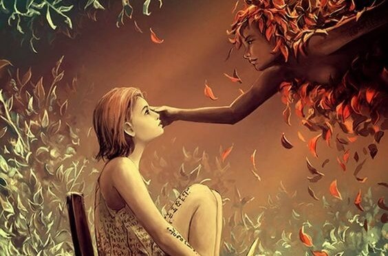 ほほを触られる少女