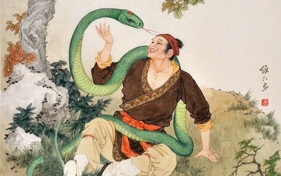 男性と蛇