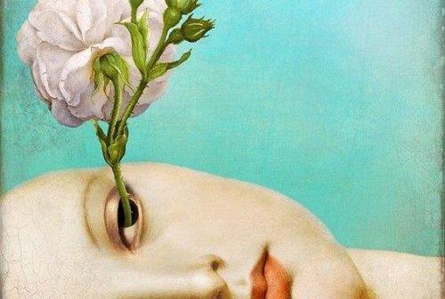 目から花が生えている女性
