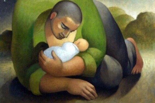 子どもを抱く男性