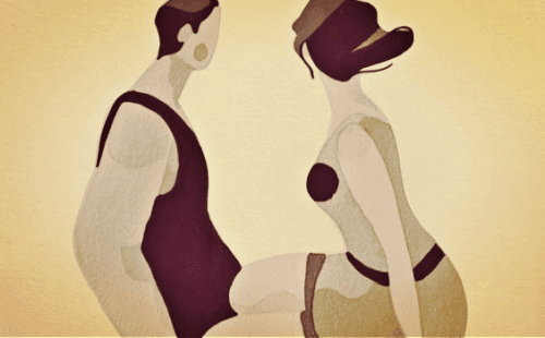 膝を寄せ合うカップル